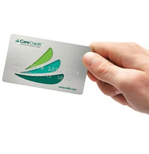hand holding carecredit card